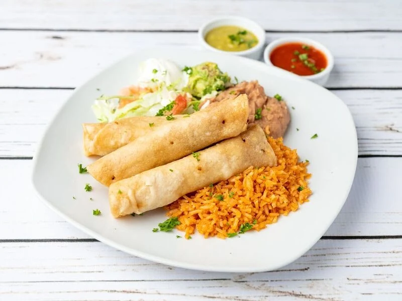 Chicken Flautas Plate - Crispy rolled chicken tacos.