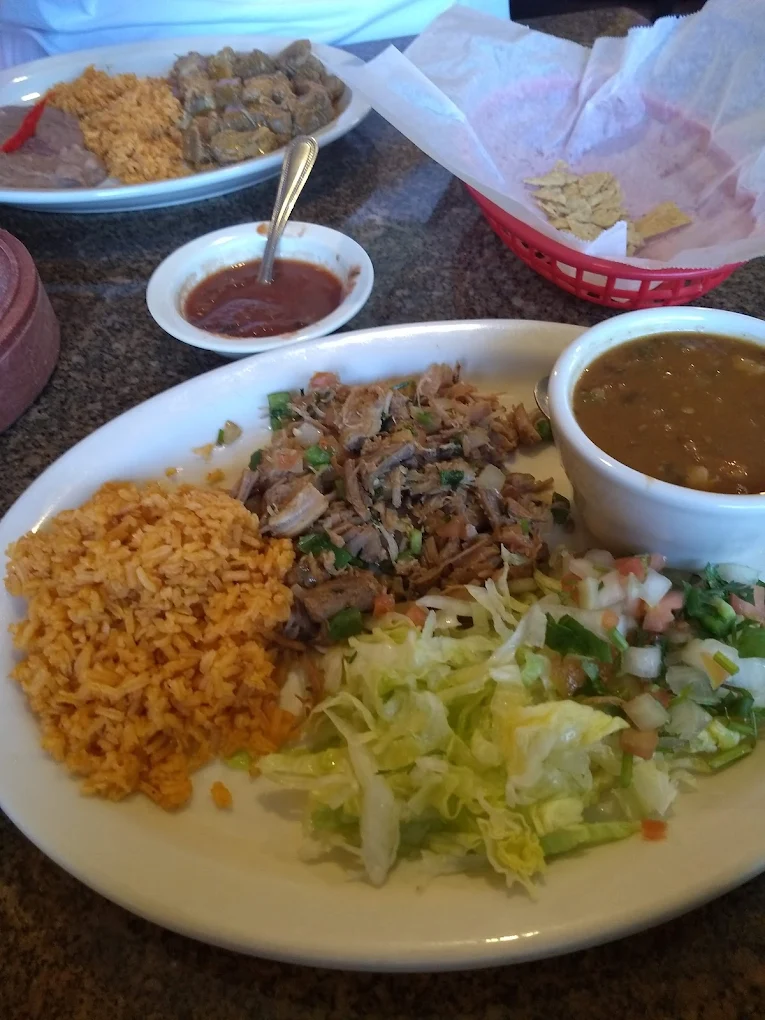 Barbacoa Plate - Slow-cooked beef barbacoa served with rice, beans, and fresh tortillas